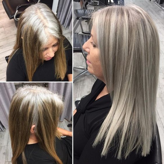 mujer de pelo largo haciéndose un cambio de look con canas en salón de belleza